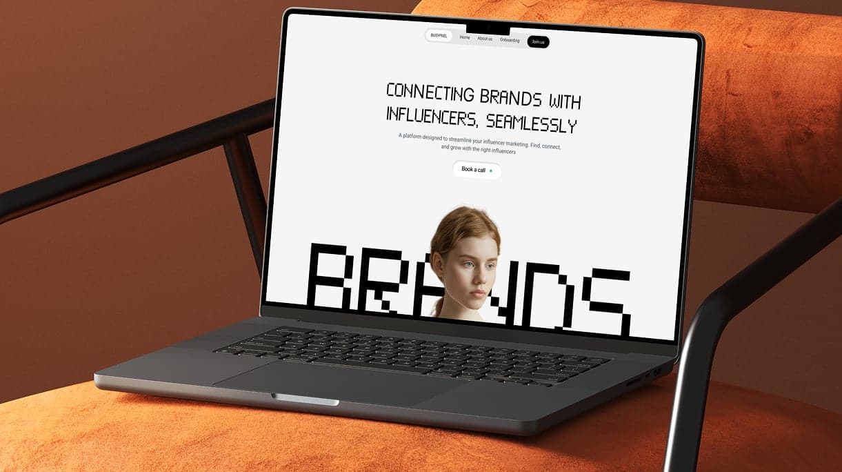 An influencer platform's landing page open on a laptop